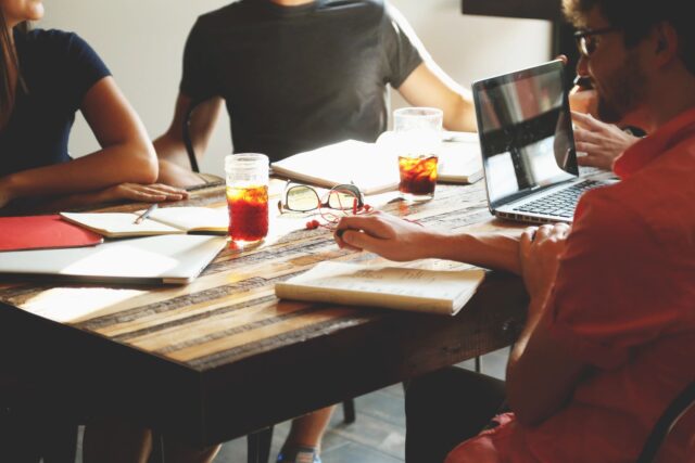 People at table working together presumably in Phoenix