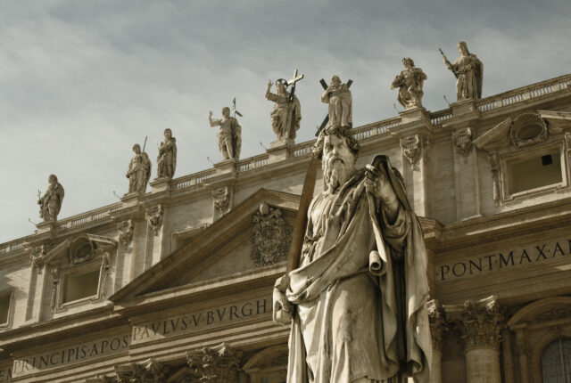 Roman statues and building with religious symbols