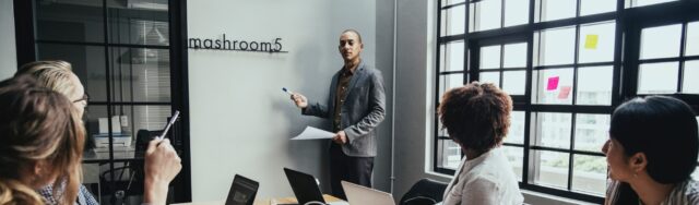 Employee in a meeting at a startup dealing with conflict