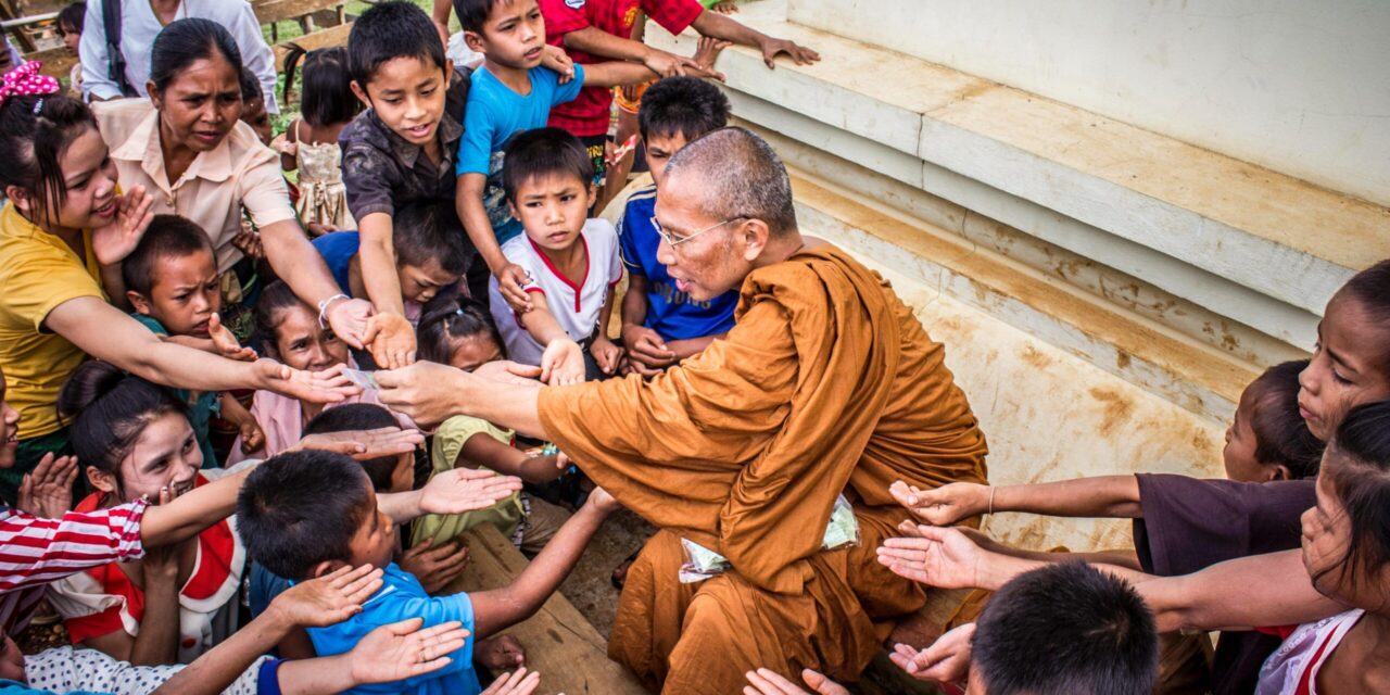https://pollackpeacebuilding.com/wp-content/uploads/2019/12/monk-surrounded-by-children-933624-scaled-1-1280x640.jpg
