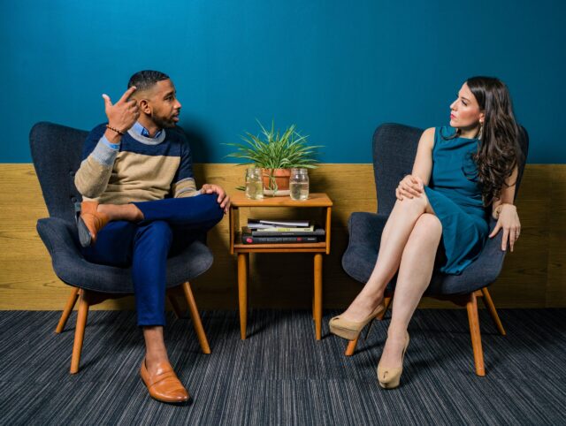 Two people having a discussion symbolizing building trust