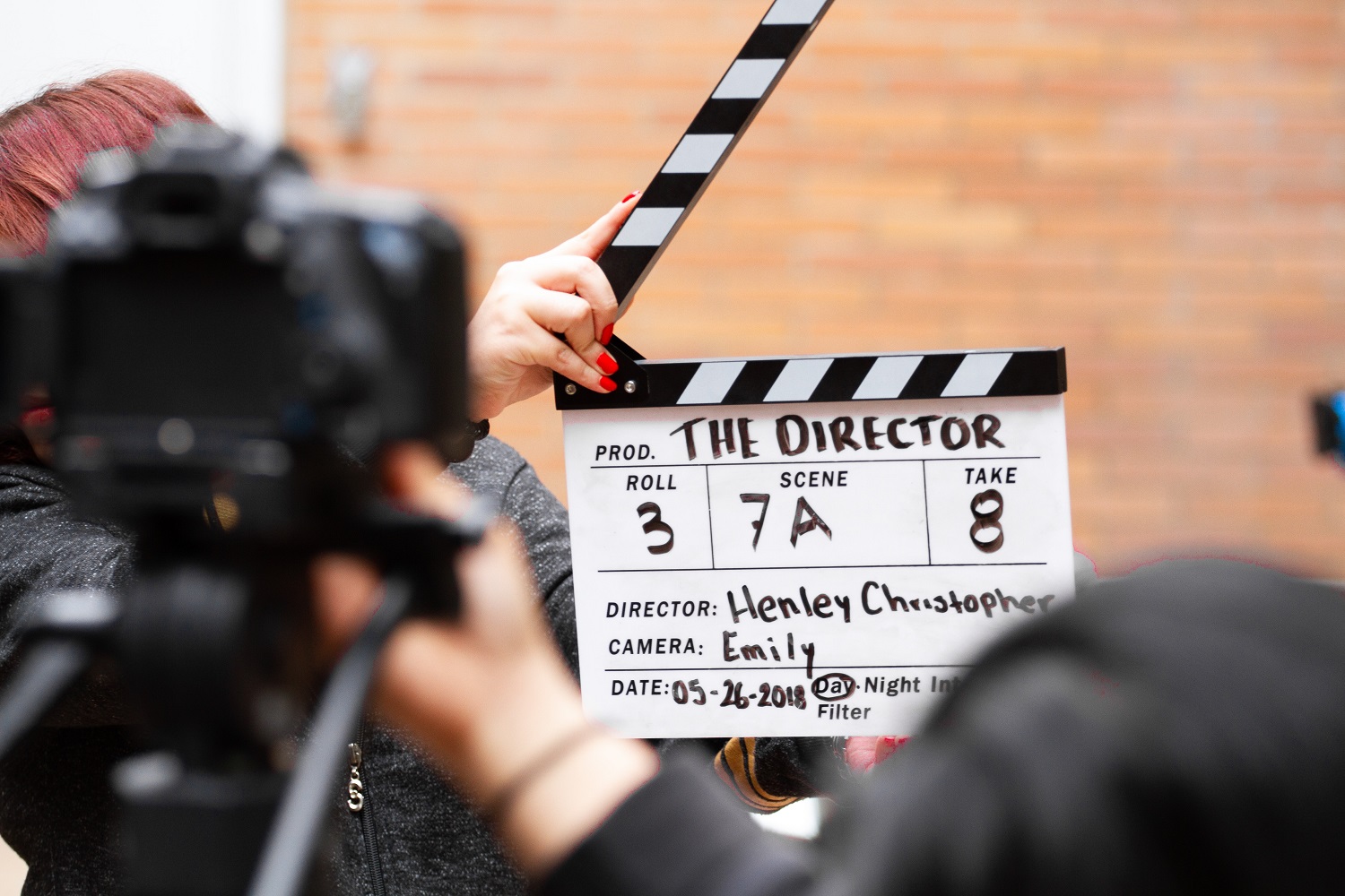 Film production crew collaborating on set