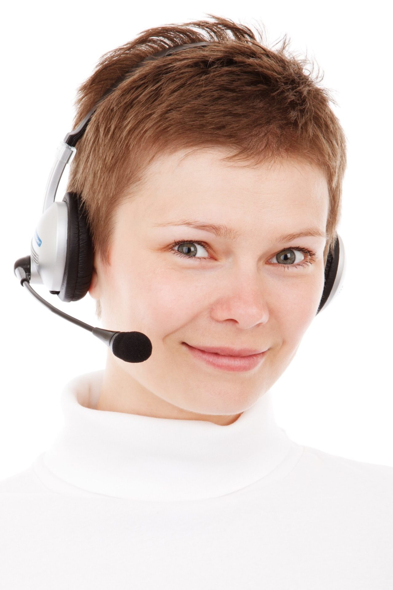 Smiling customer service agent wearing a headset