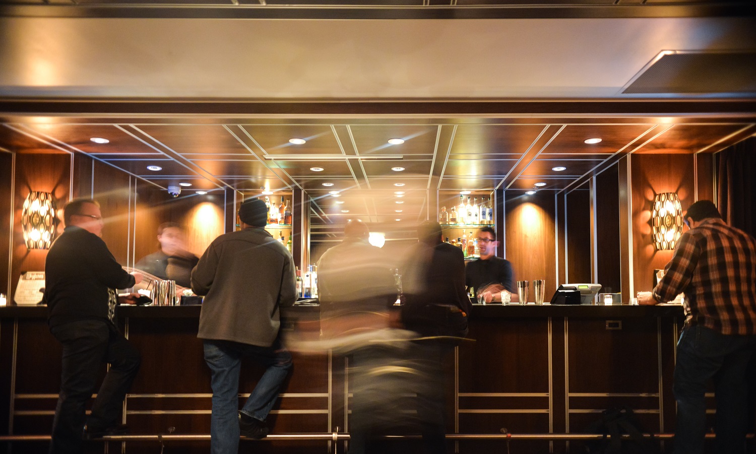 Bartender working the bar during service