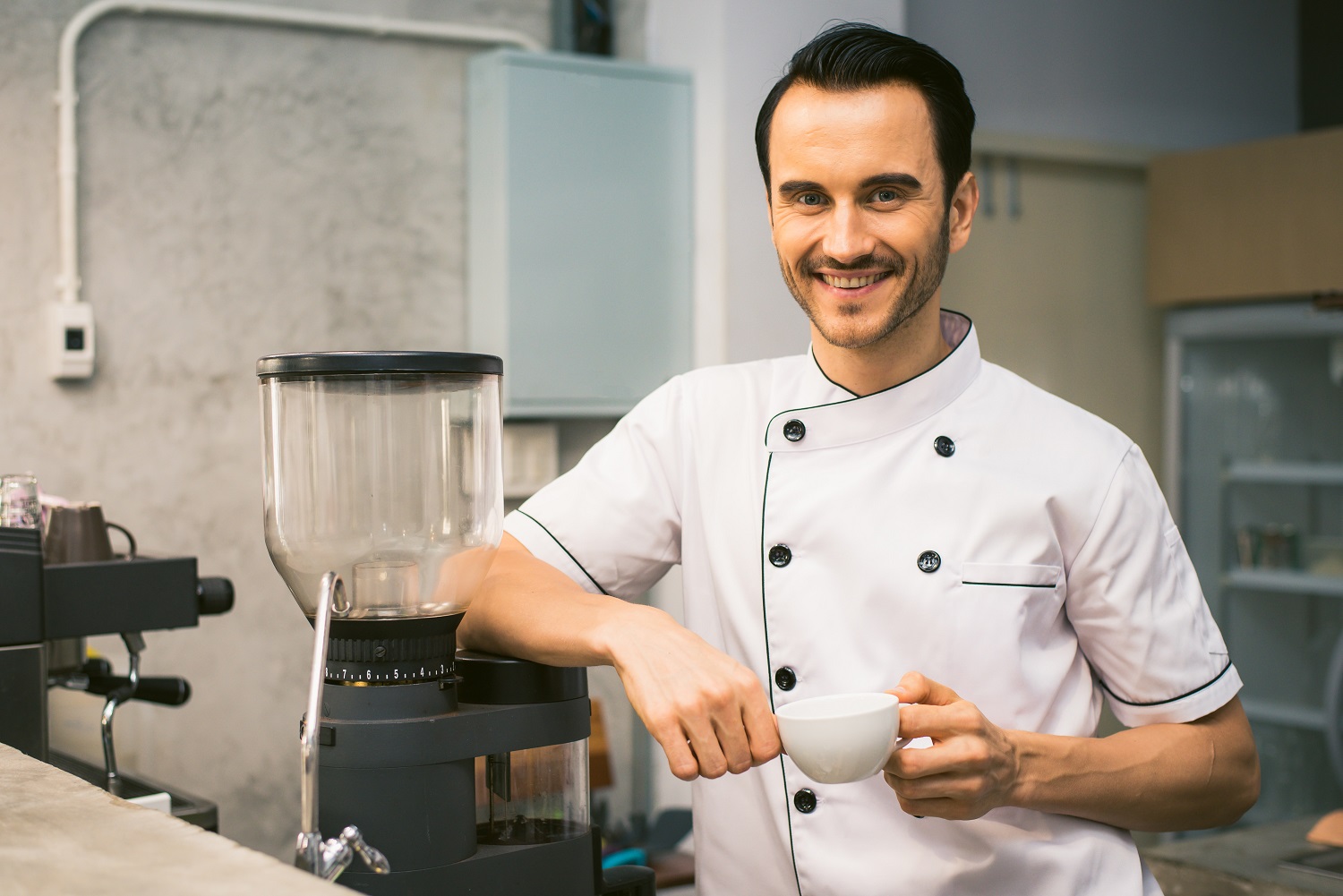 Smiling chef in a restaurant kitchen