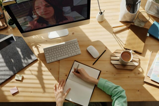 Women's face on computer screen representing conflict resolution training online