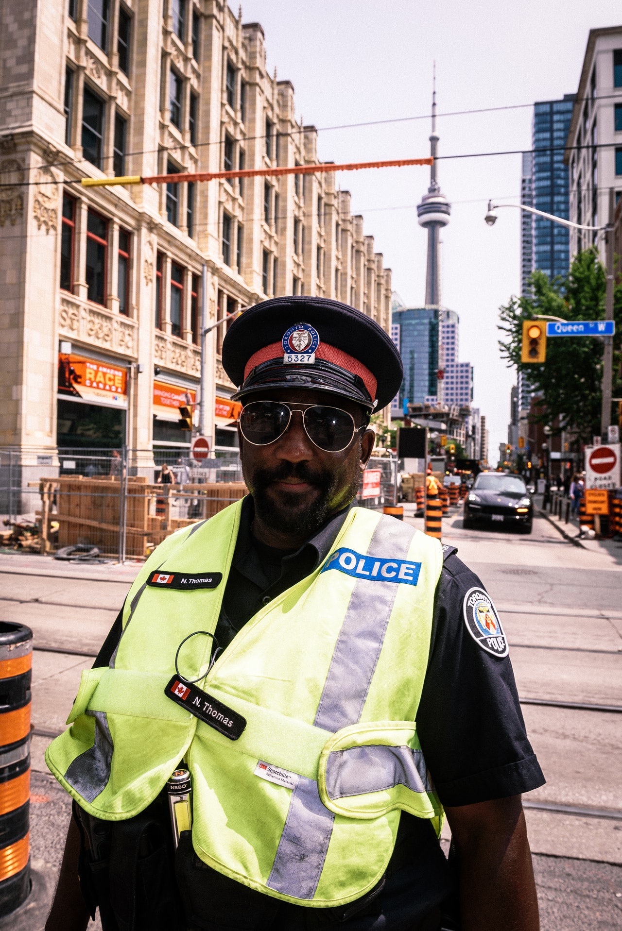 Law Enforcement & Security Police officer standing on a city street