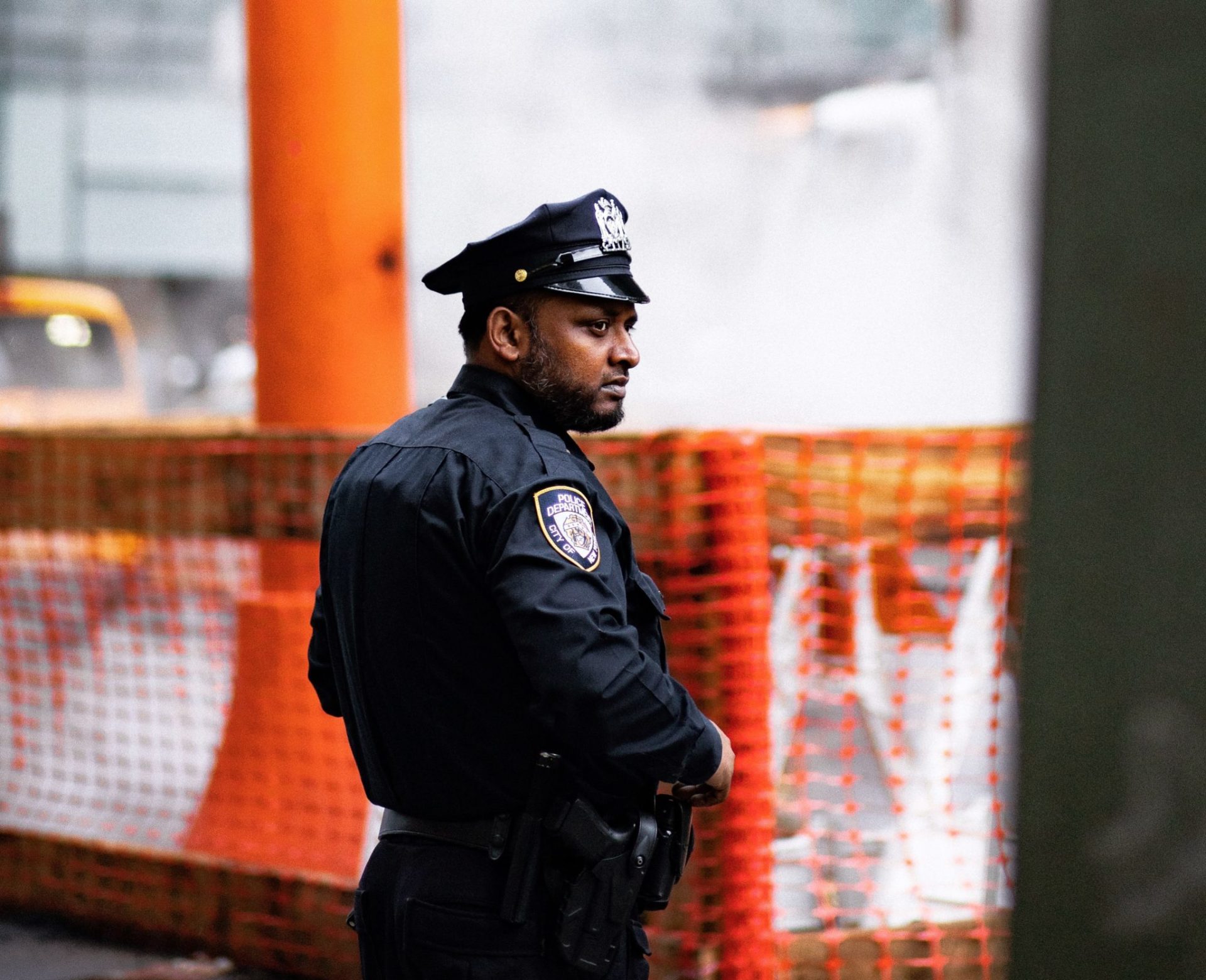 Security officer monitoring a public area in the city