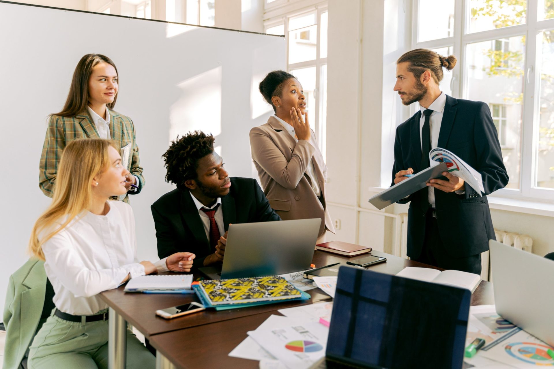 Diversity Training in the Workplace Diverse colleagues collaborating in a workplace meeting
