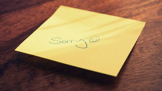 sorry on a post-it note showing how to give an honest apology