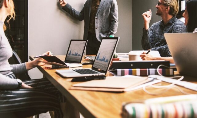 Happy employees while in a presentation