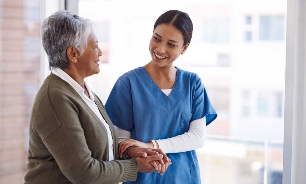 Nurse talking to an elderly patient after conflict deescalation