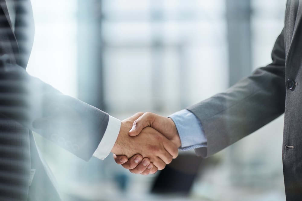 Closeup of a handshake between two business partners