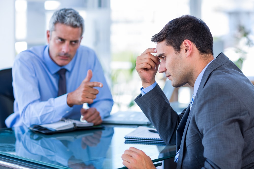 Business people having an argument in office