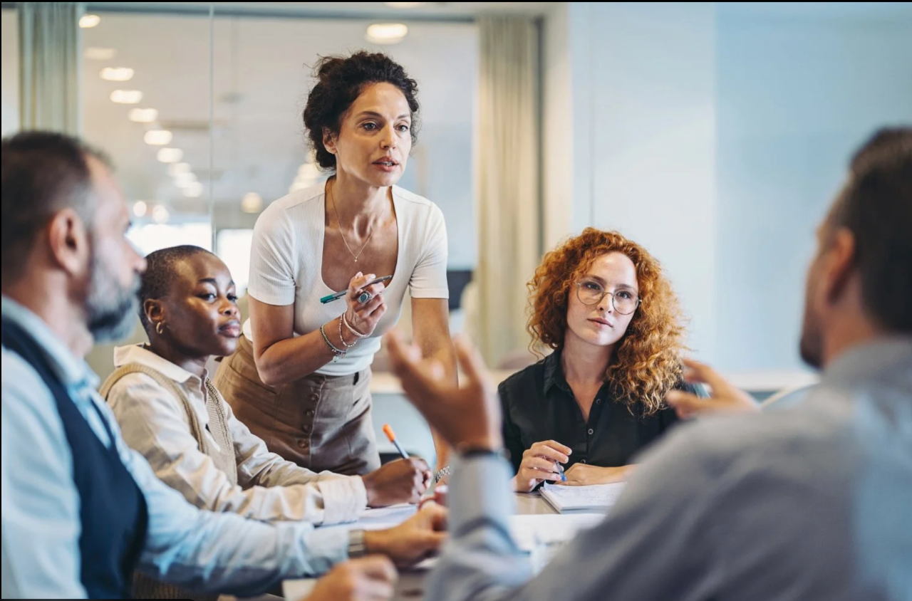 A group of professionals in a facilitated dialogue session