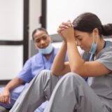 Nurse working a demanding hospital shift in a high-pressure environment