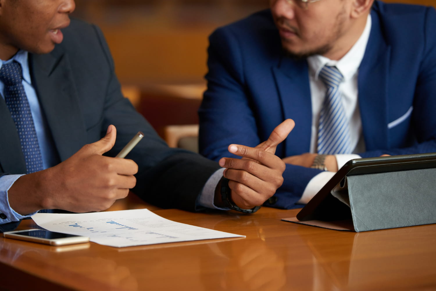Two financial-services colleagues in a mediated conversation
