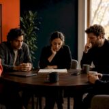 Exhausted team showing workplace burnout